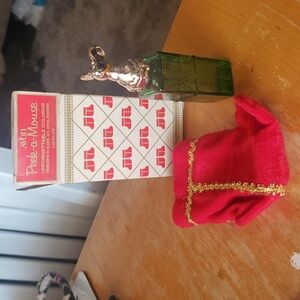 Vintage Avon Peek-a- Mouse Sweet Honesty Cologne Green Bottle.